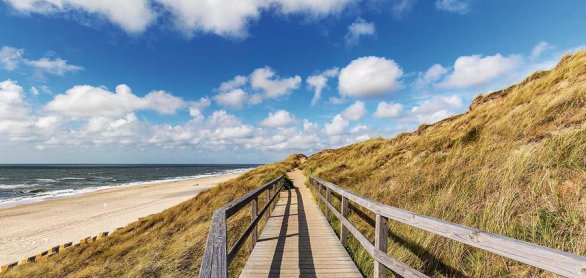 View from Wooden Boardwalk at Wenningstedt towards Beach with th © Manninx - stock.adobe.com