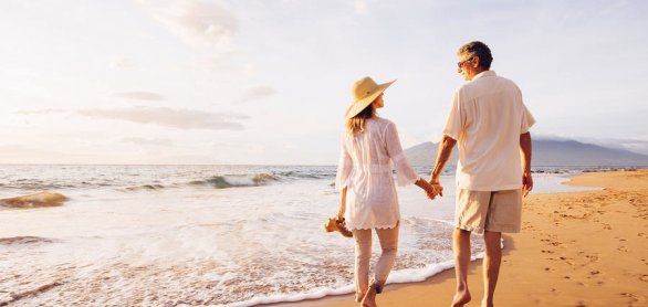 Mature Couple Walking on the Beach at Sunset © EpicStockMedia - stock.adobe.com