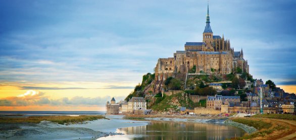 Mont St Michel at sunset , France © neirfy - stock.adobe.com